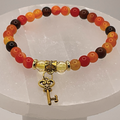 Amber Mahogany Obsidian Citrine Ornate Key Charm Bracelet