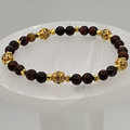 Pulsera de obsidiana caoba con espaciadores dorados
