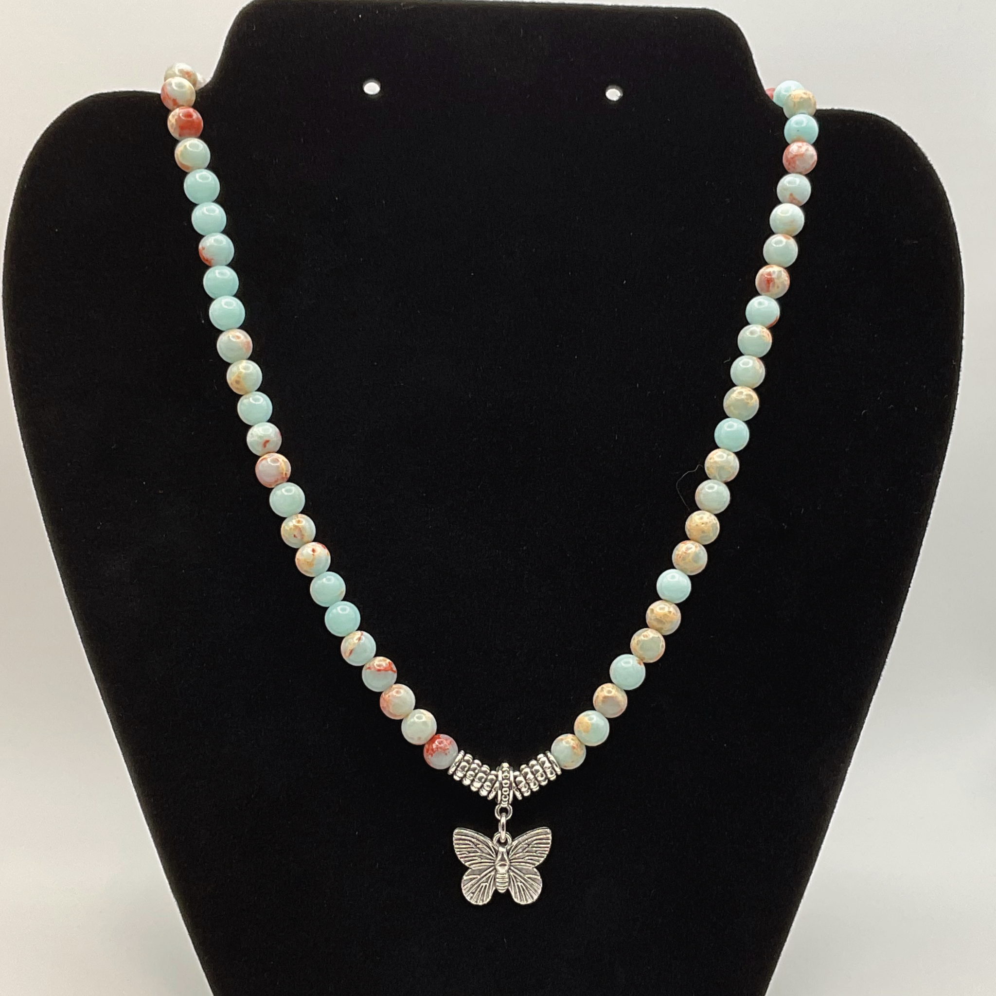 18" Blue Howlite Butterfly Charm Necklace with Silver Barrel Spacers