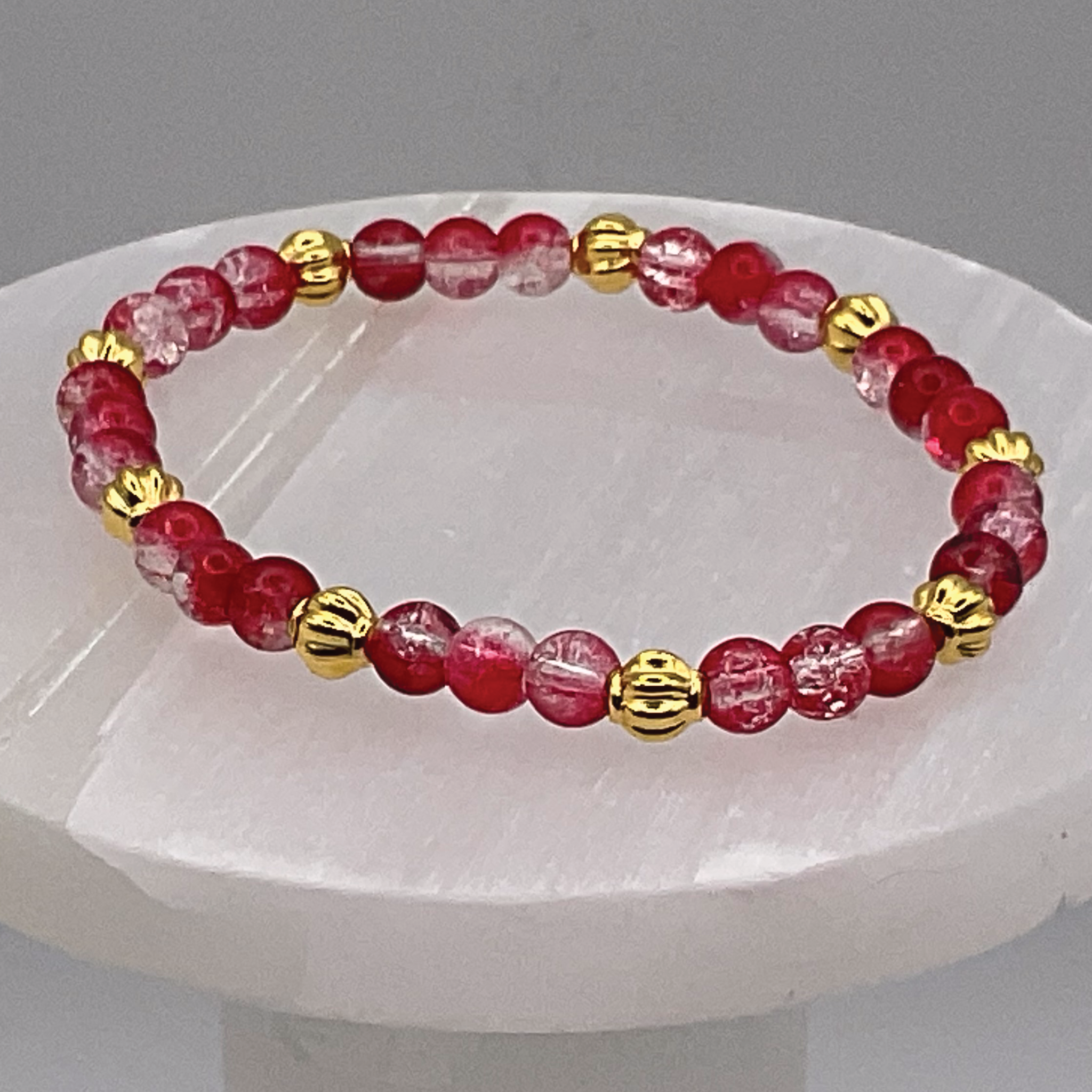 Red Glass Bracelet with Gold Lobed Spacers
