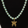 20" Light Green Butterfly Charm Glass Necklace with Gold Spacers