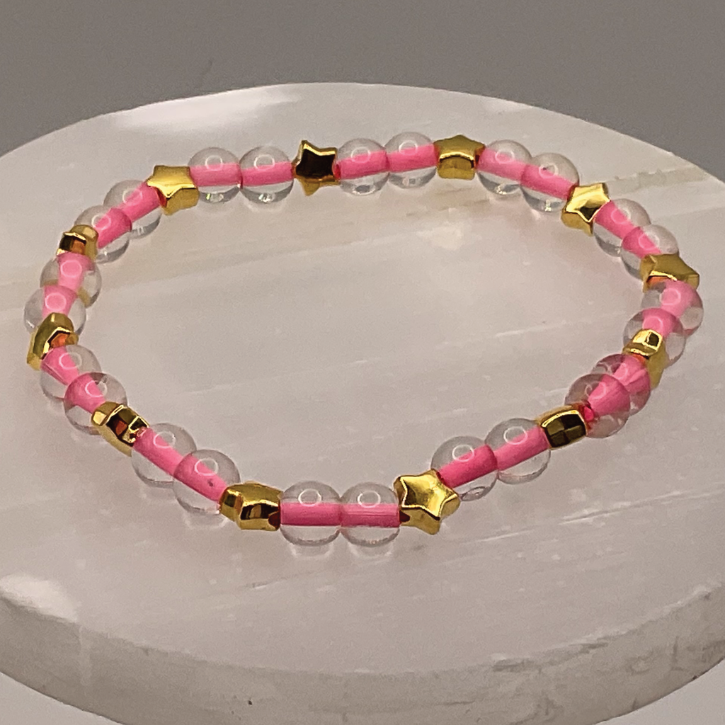 Clear Lined Pink Glass Bracelet with Gold Star Spacers