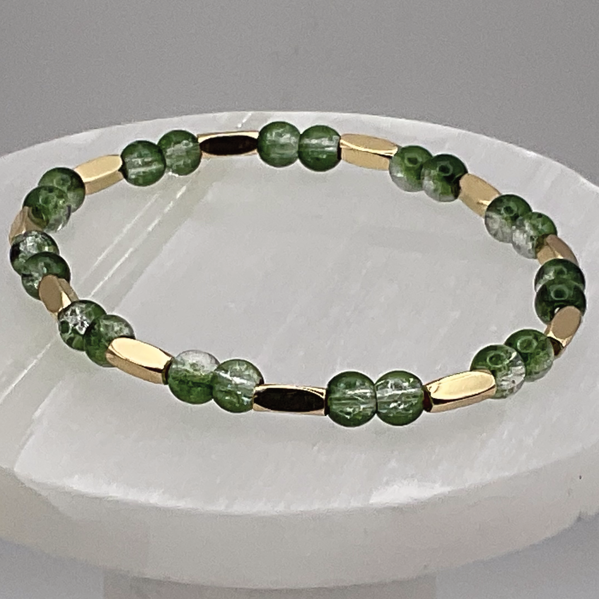Green Glass Bracelet with Long Gold Spacers