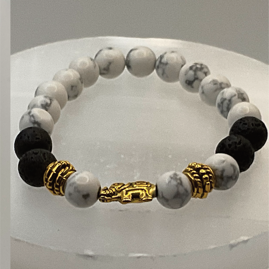 Howlite Lava Elephant Charm Bracelet with Gold Tone Spacers