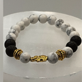 Howlite Lava Elephant Charm Bracelet with Gold Tone Spacers