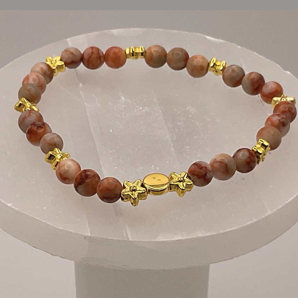 Red Vein Jasper Bracelet with Gold Tone Star and Disc Spacers
