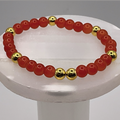 Orange Glass Bracelet with Gold Spacers