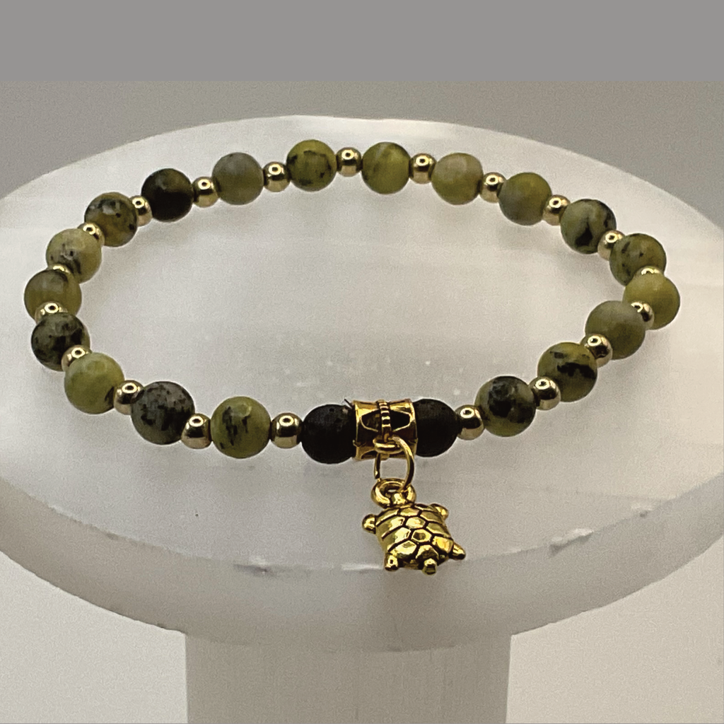 Serpentine Lava Turtle Charm Bracelet with Gold Tone Spacers