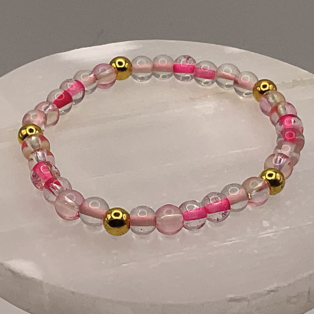 Clear Lined Pink Glass Bracelet with Gold Spacers