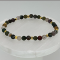 Pulsera de cuarzo lechoso y labradorita con espaciadores dorados