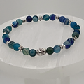 Pulsera de ágata Vena de Dragón Azul con espaciadores de barril y flor de plata
