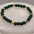 15 cm (5.9") Dark Green Glass Bracelet with Gold Star Spacers