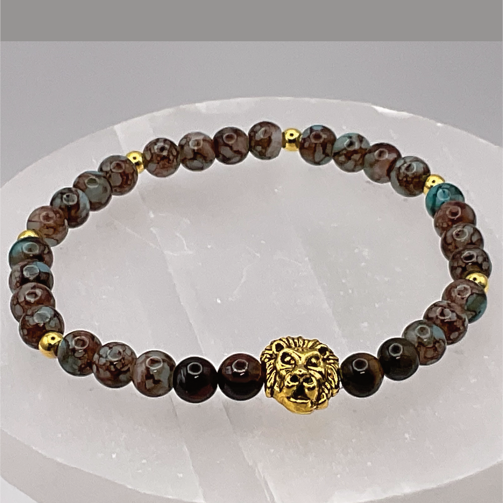 Blue Howlite Lion Charm Bracelet with Gold Tone Spacers