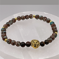 Blue Howlite Lion Charm Bracelet with Gold Tone Spacers