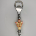 Abrebotellas de mariposa