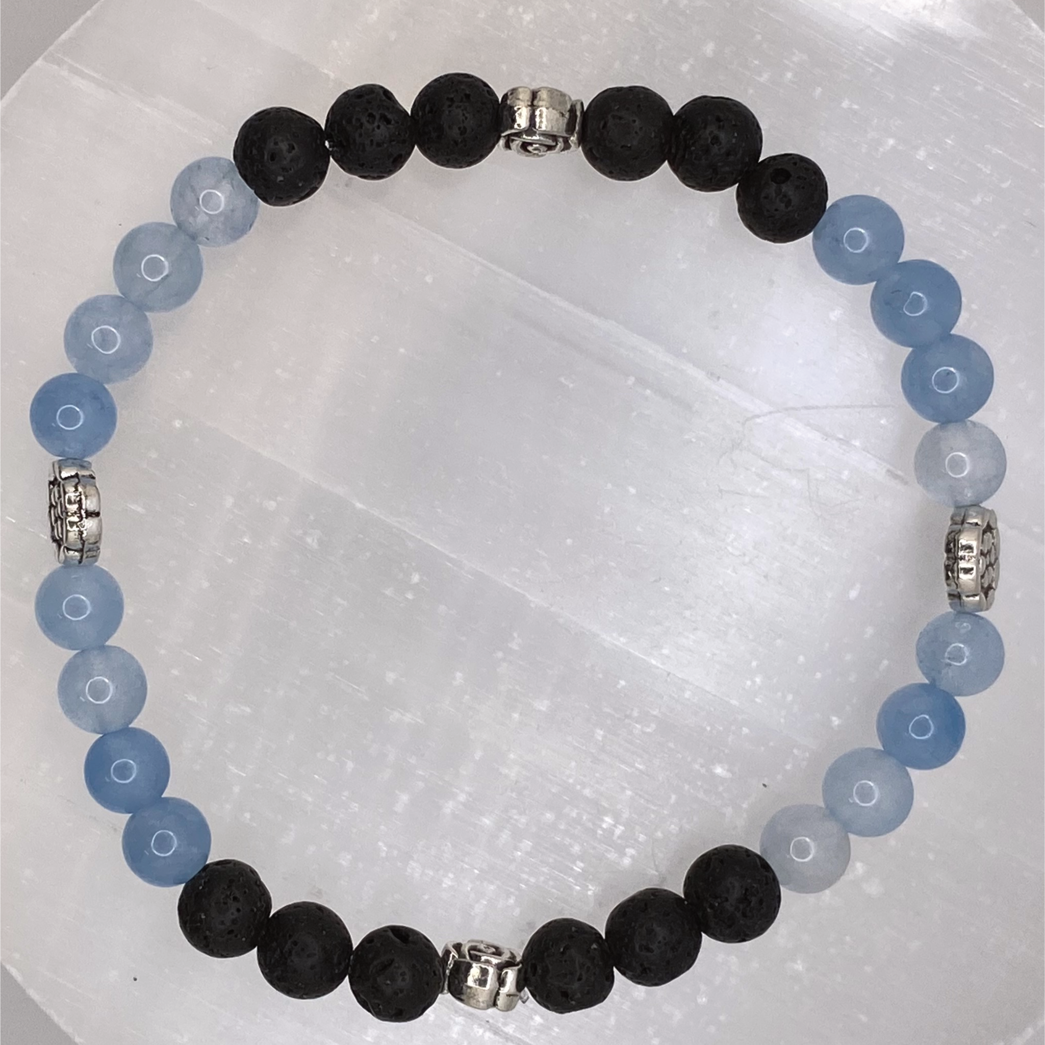 Pulsera de berilo aguamarina y roca de lava con espaciadores de plata