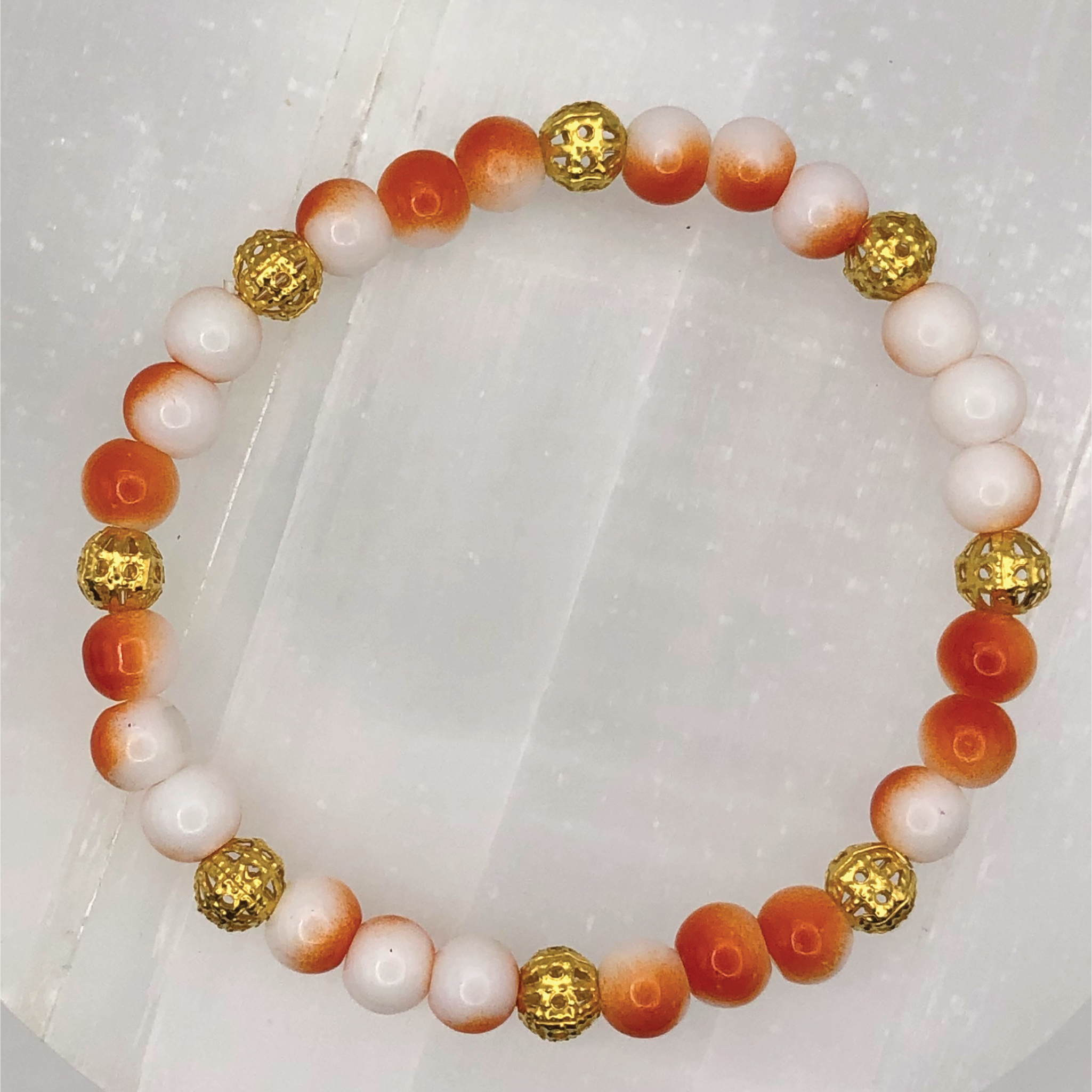 15.5 cm (6.1") Orange White Bracelet with Gold Spacers