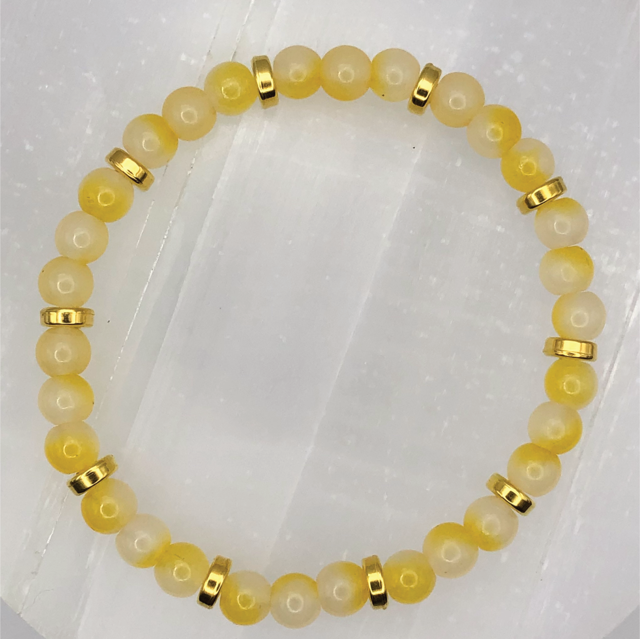 Yellow Glass Bracelet with Gold Disc Spacers