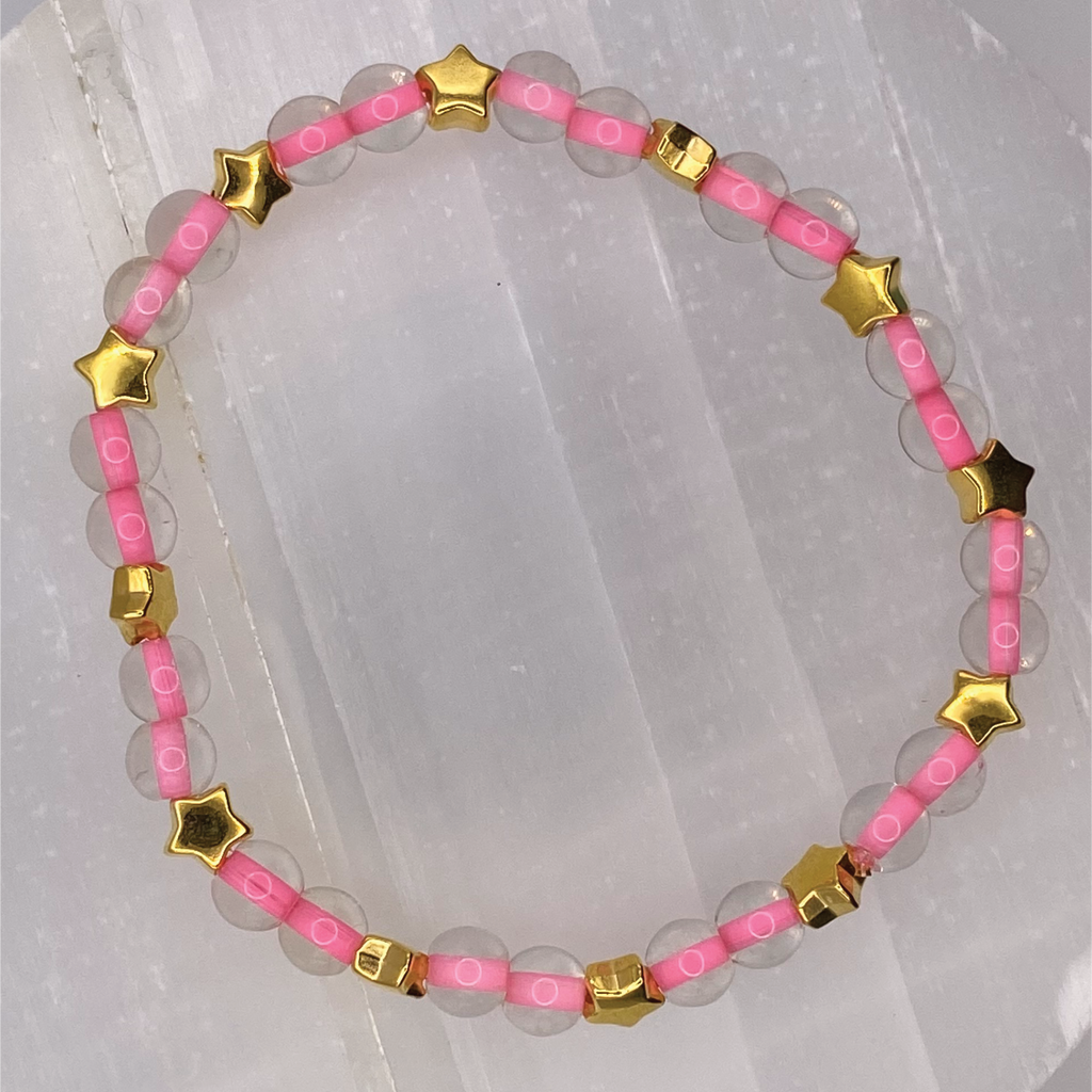 Clear Lined Pink Glass Bracelet with Gold Star Spacers
