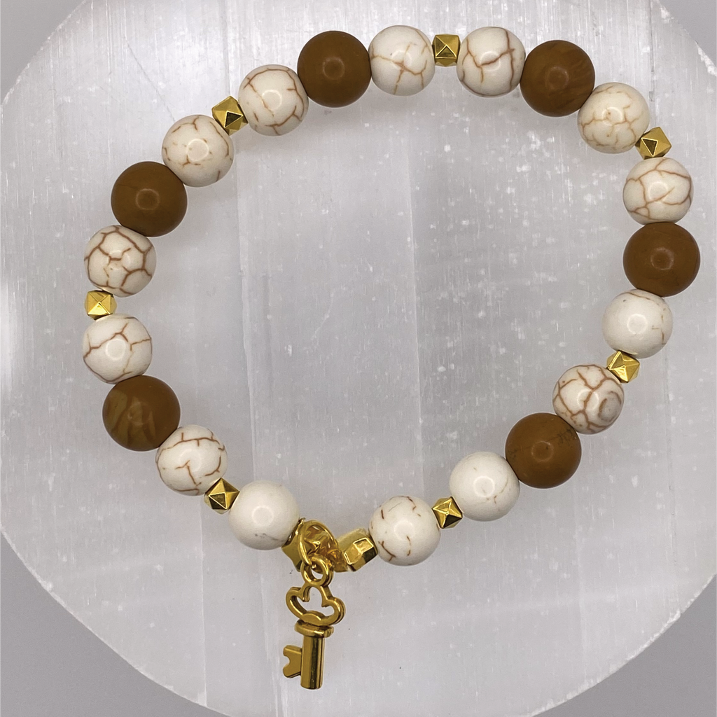 Magnesite Yellow Jasper Key Charm Bracelet with Gold Tone Spacers