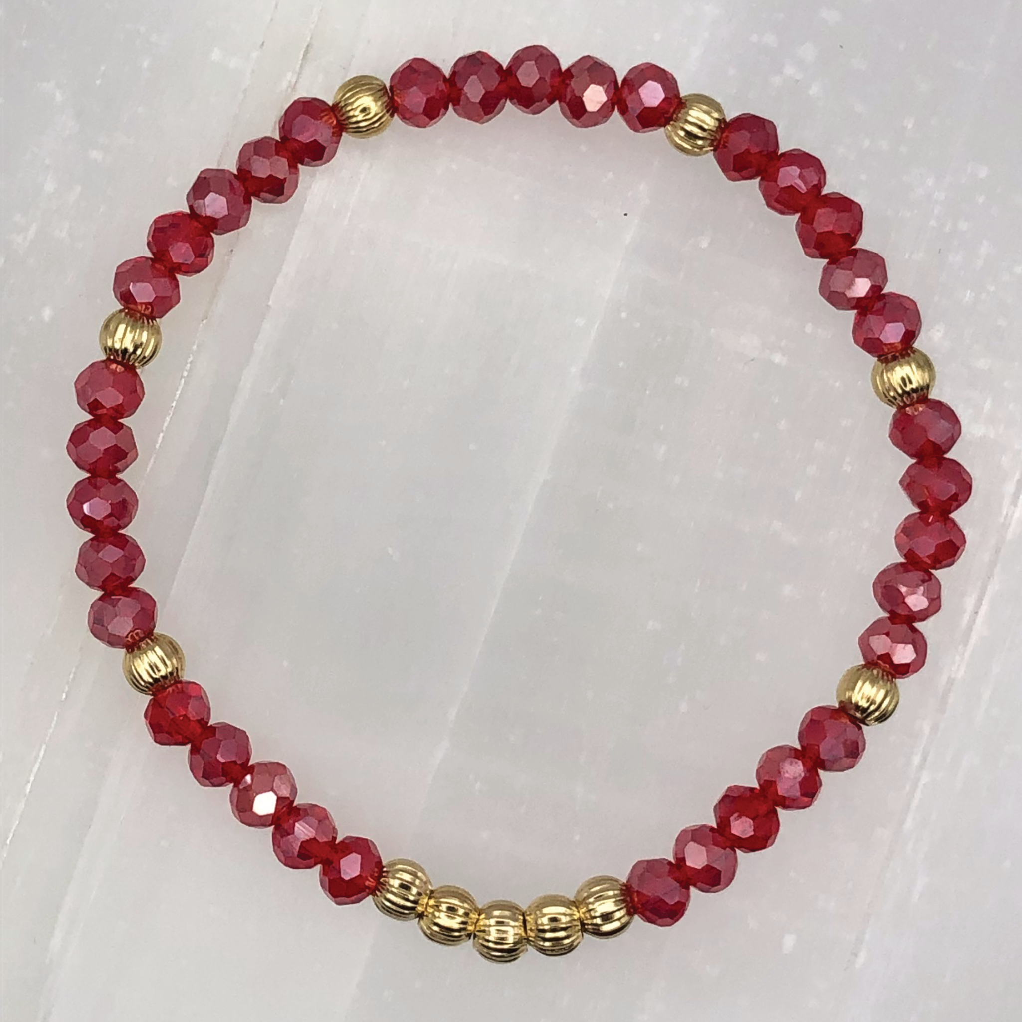 14.5 cm (5.7") Red Bracelet with Gold Spacers