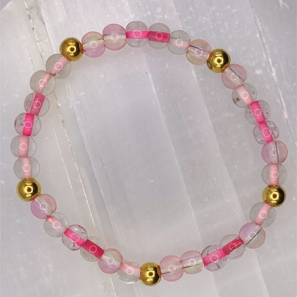 Clear Lined Pink Glass Bracelet with Gold Spacers