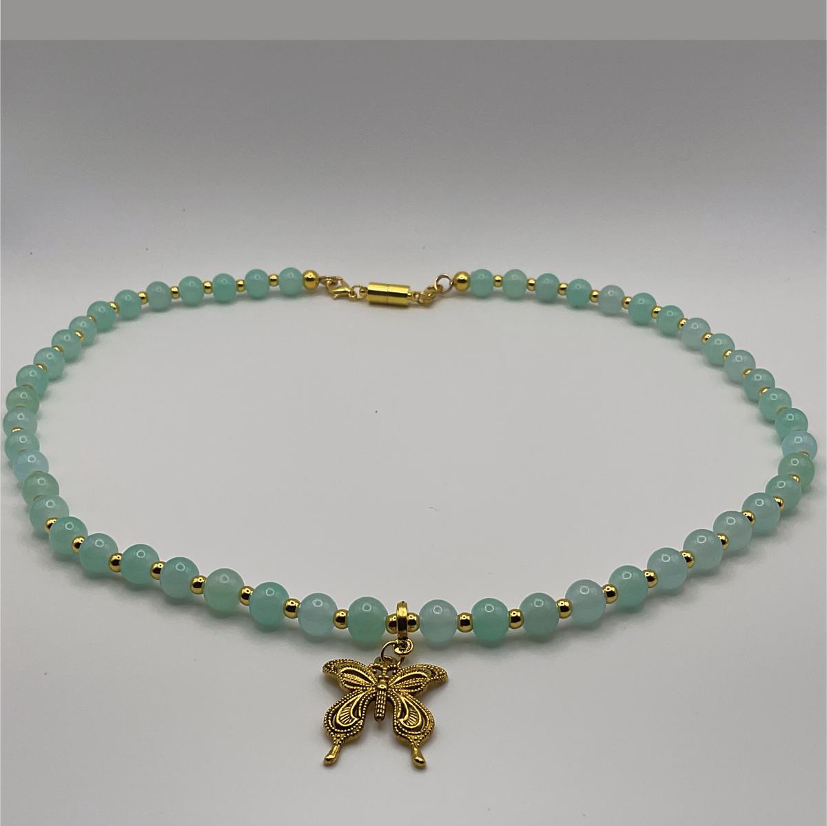 20" Light Green Butterfly Charm Glass Necklace with Gold Spacers