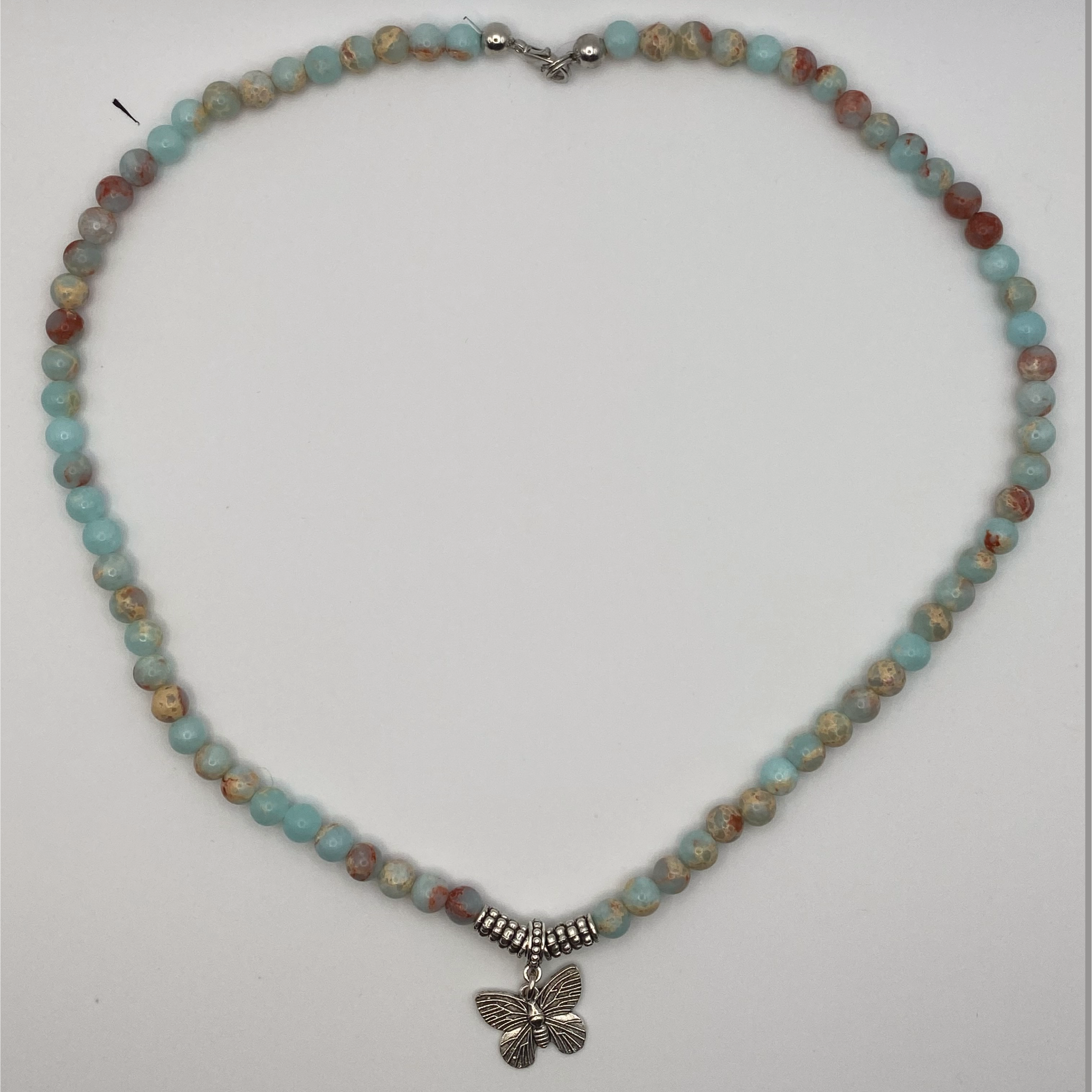 18" Blue Howlite Butterfly Charm Necklace with Silver Barrel Spacers
