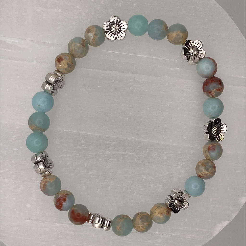 Pulsera de Calcita con Separadores de Flores de Plata