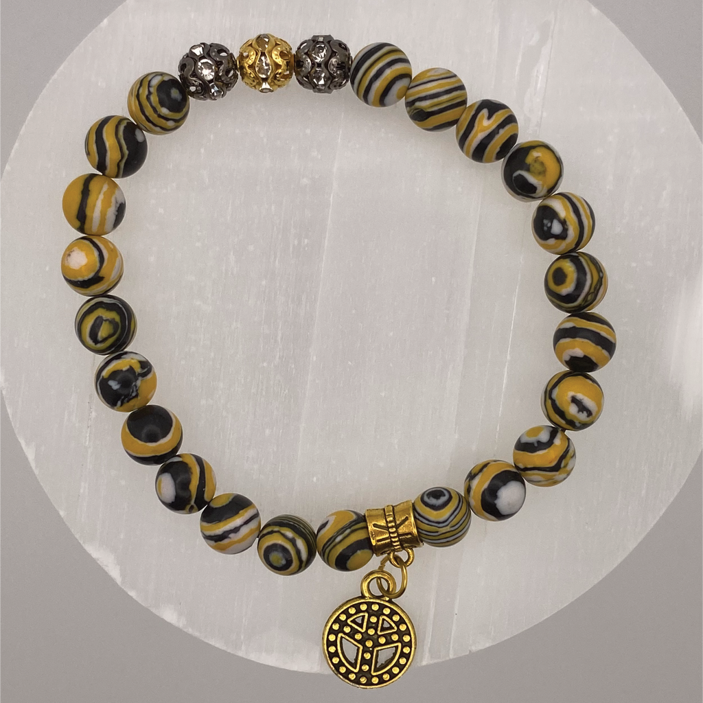 Pulsera de cuentas de jaspe abejorro con espaciadores dorados y negros