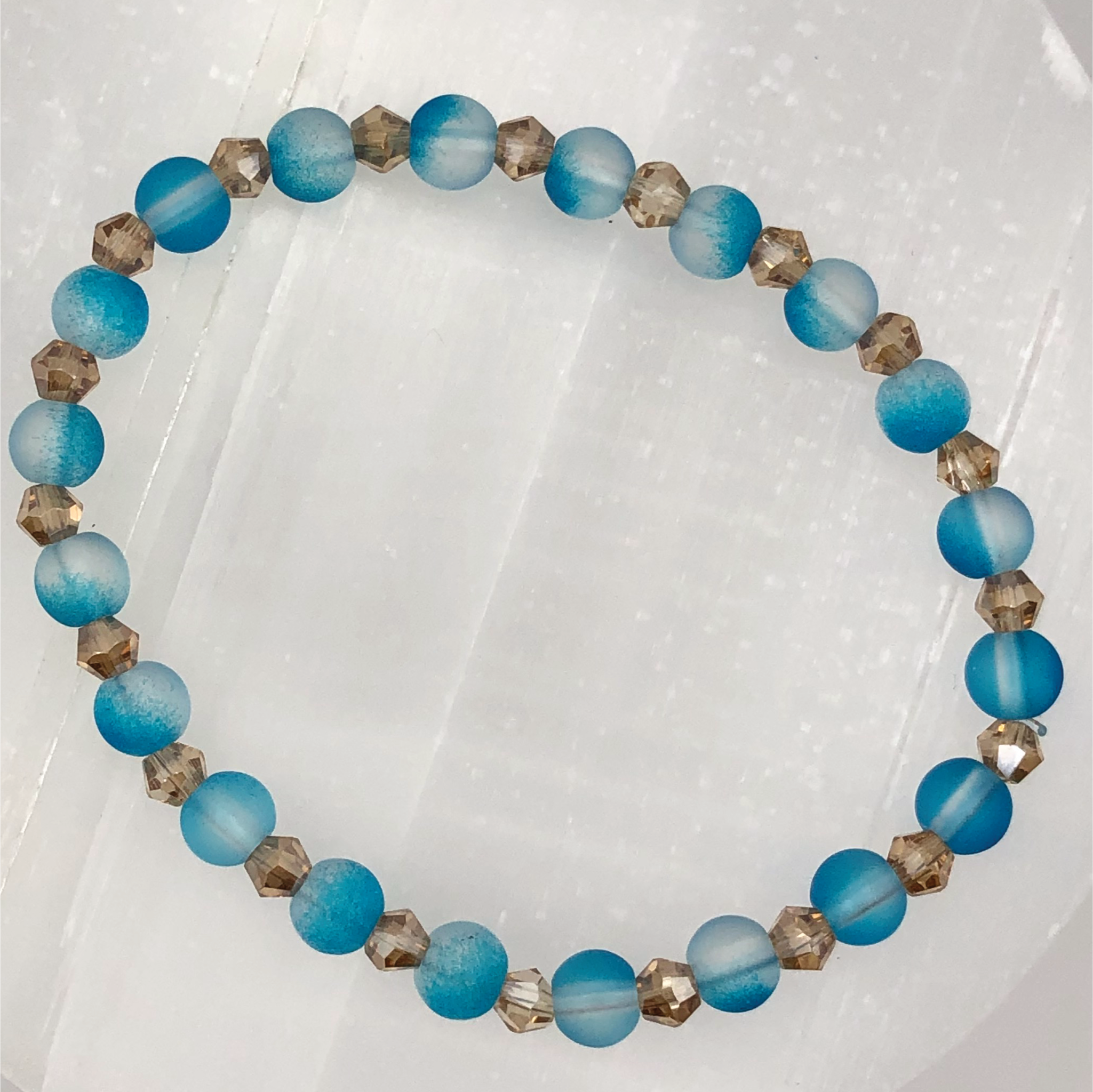 Frosted Blue Glass Bracelet with Champagne Spacers