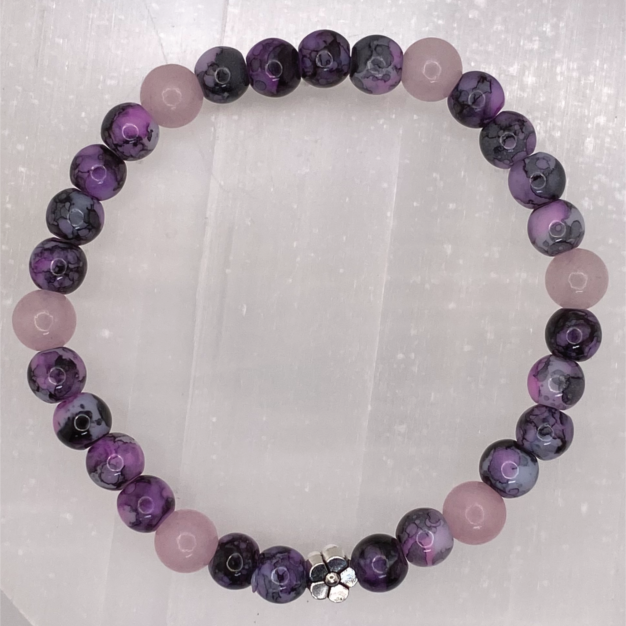 Amethyst Pink Quartz Bracelet with a Silver Spacer