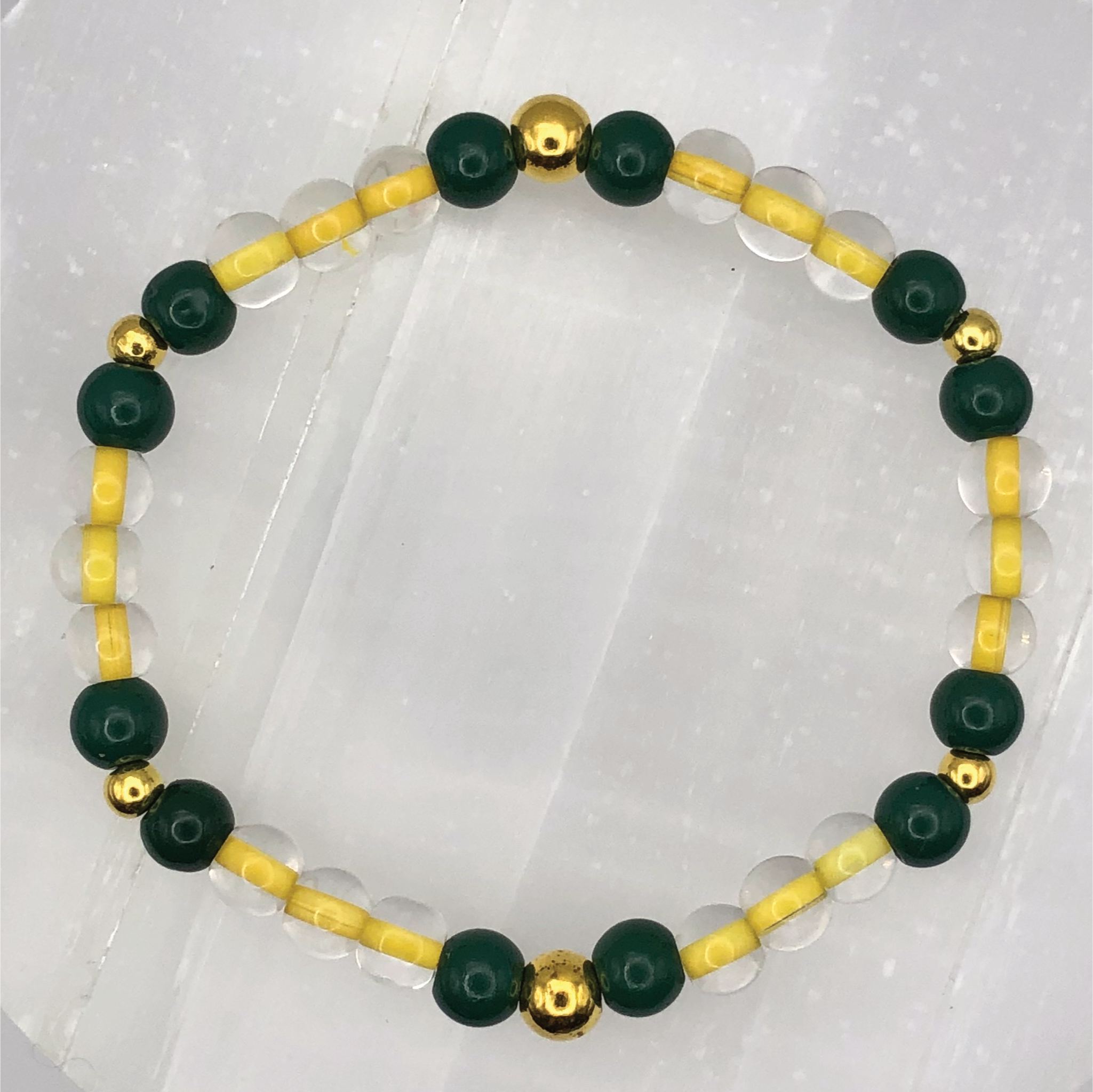 Yellow Green Glass Bracelet with Gold Spacers