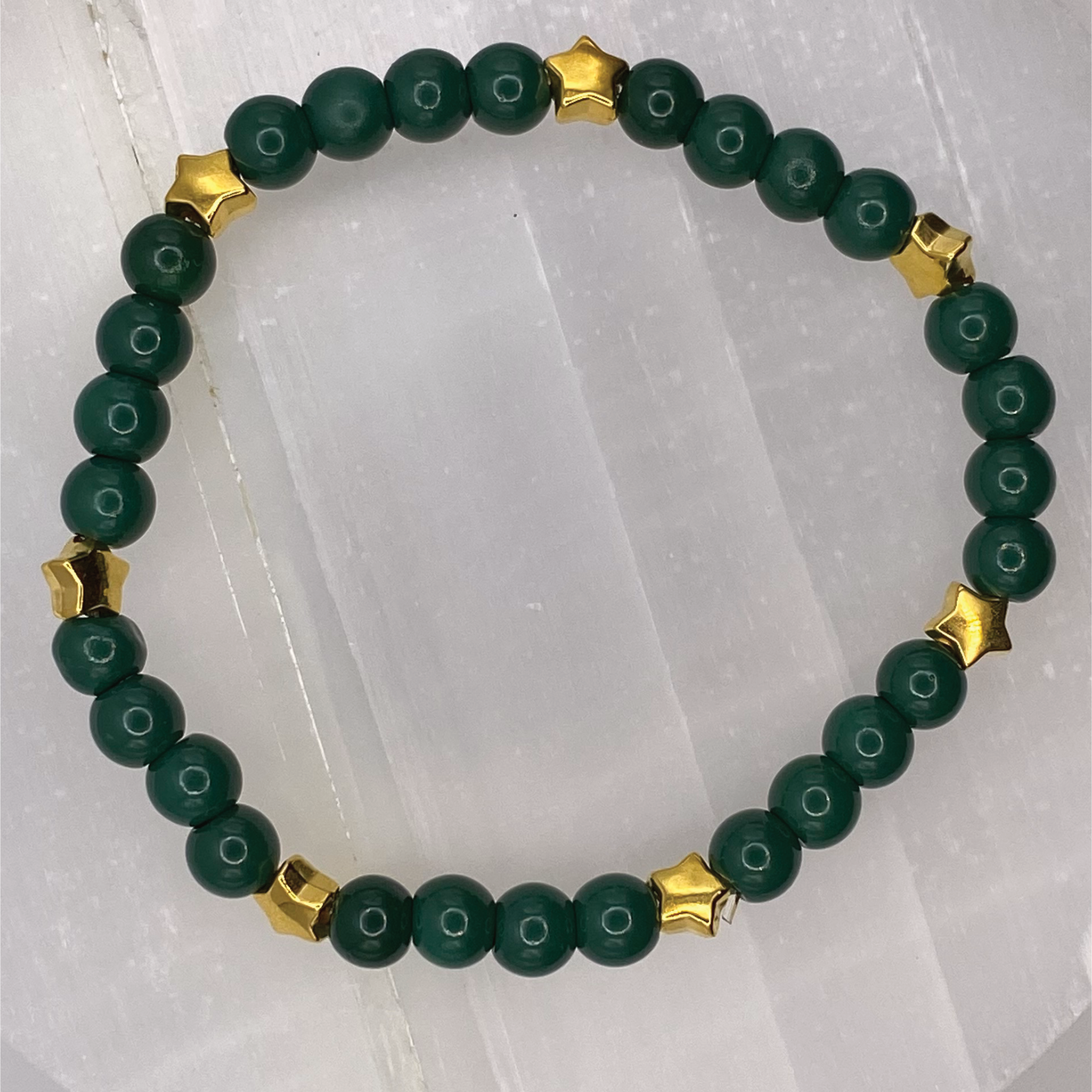 15 cm (5.9") Dark Green Glass Bracelet with Gold Star Spacers
