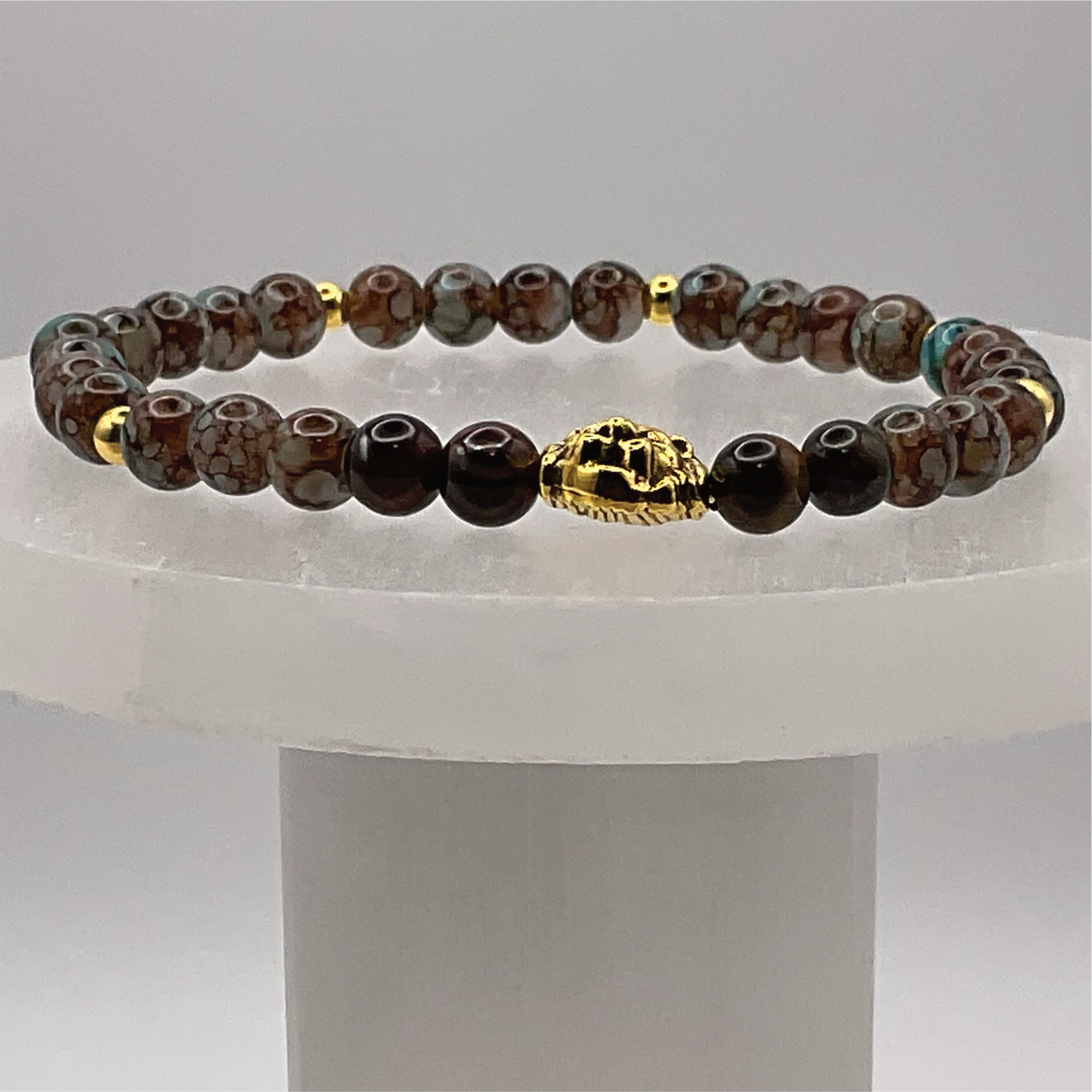 Blue Howlite Lion Charm Bracelet with Gold Tone Spacers