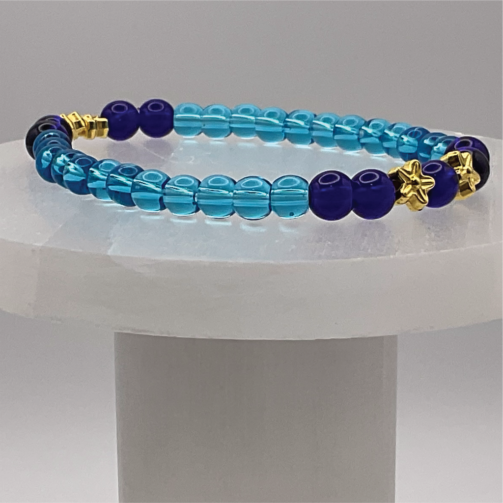 Amethyst Blue Sea Glass Bracelet with Gold Tone Spacers