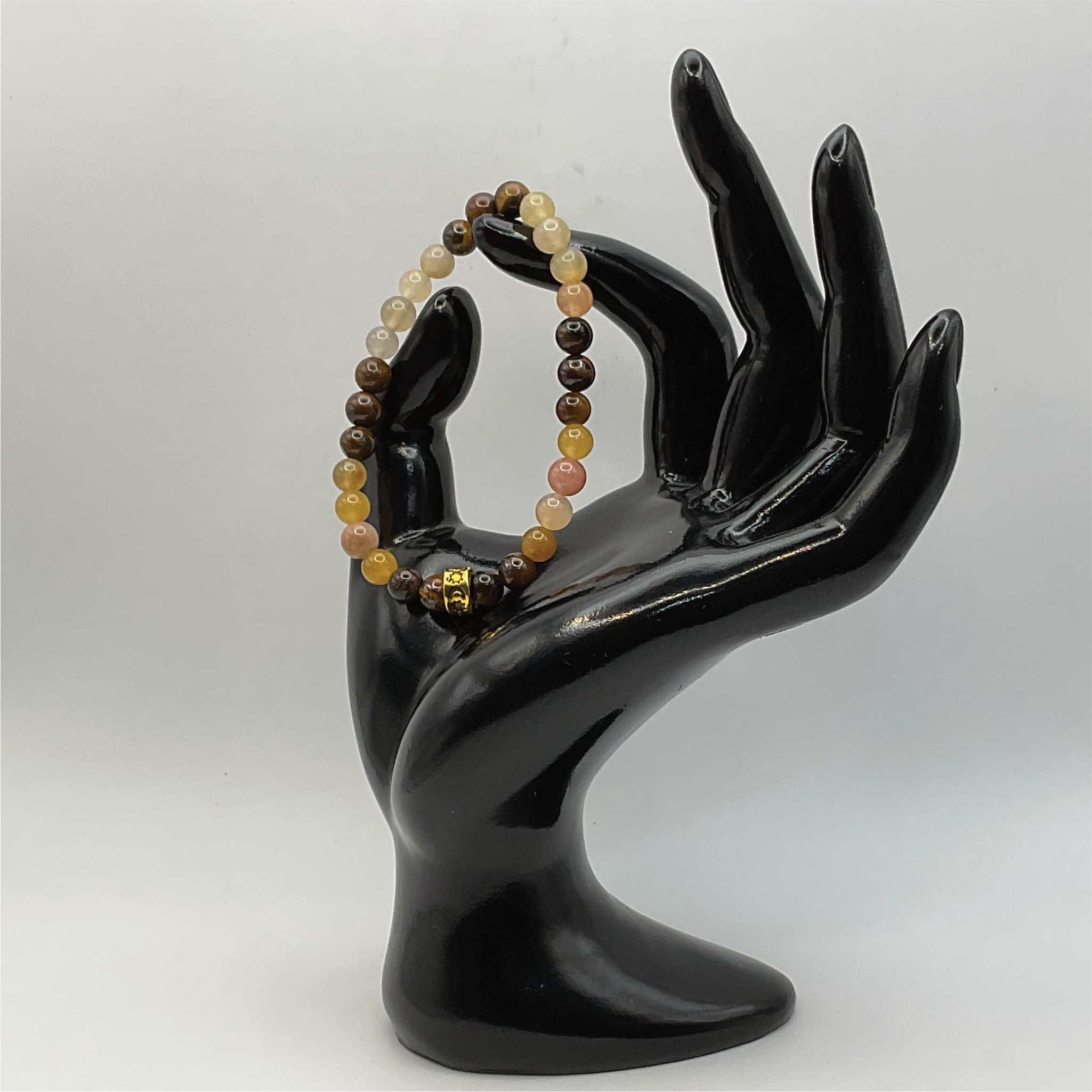 Pulsera de Calcedonia Ojo de Tigre con Separador Tono Dorado