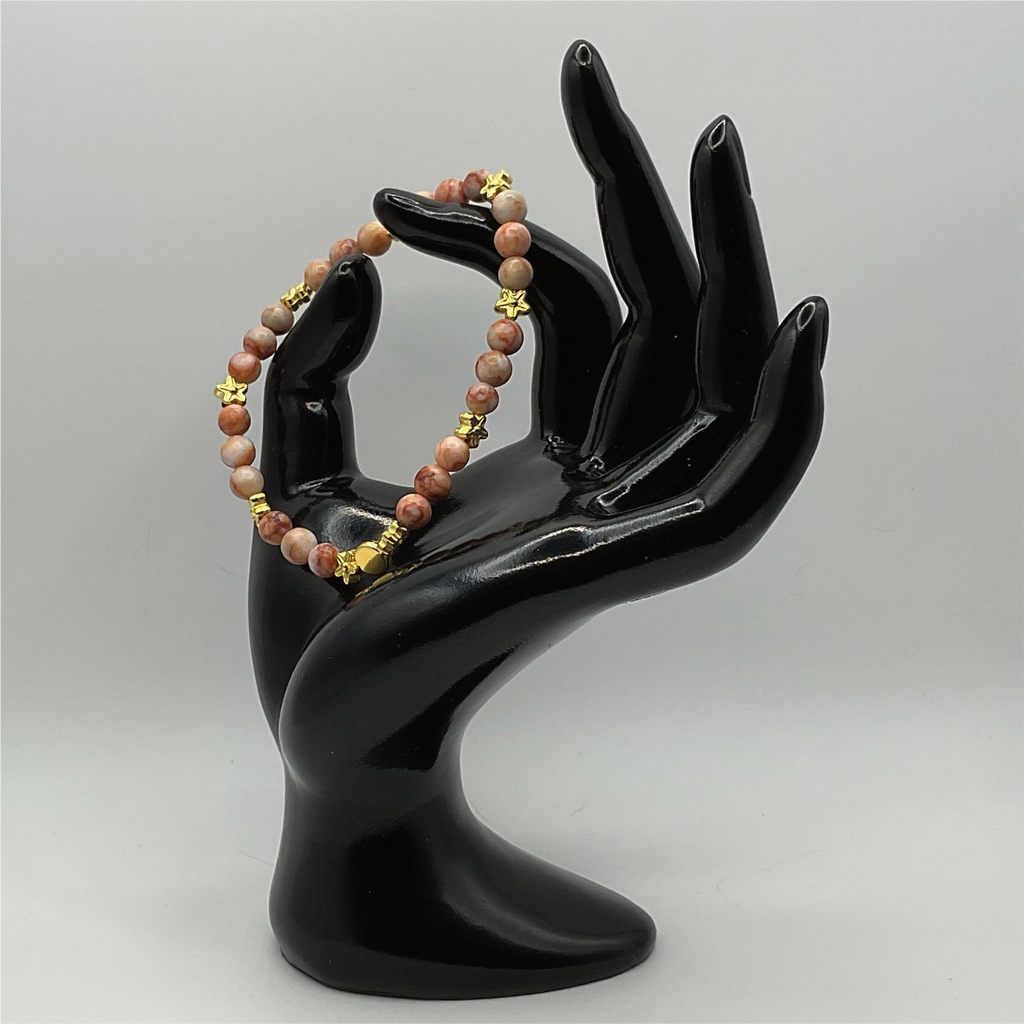 Red Vein Jasper Bracelet with Gold Tone Star and Disc Spacers