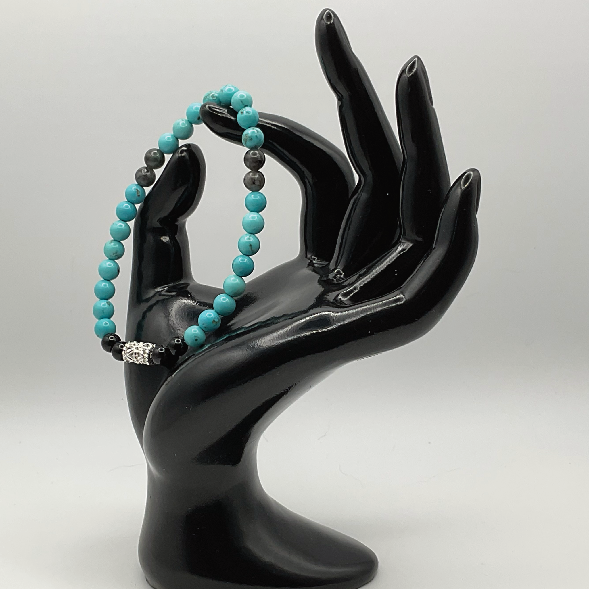 Turquoise Howlite Black Agate Bracelet with Silver Tone Barrel Spacer