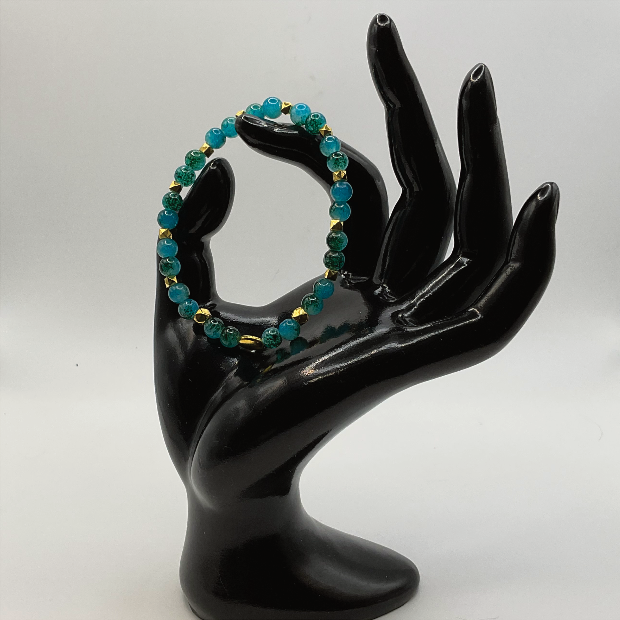 Blue Green Glass Bracelet with Gold Disc Spacers