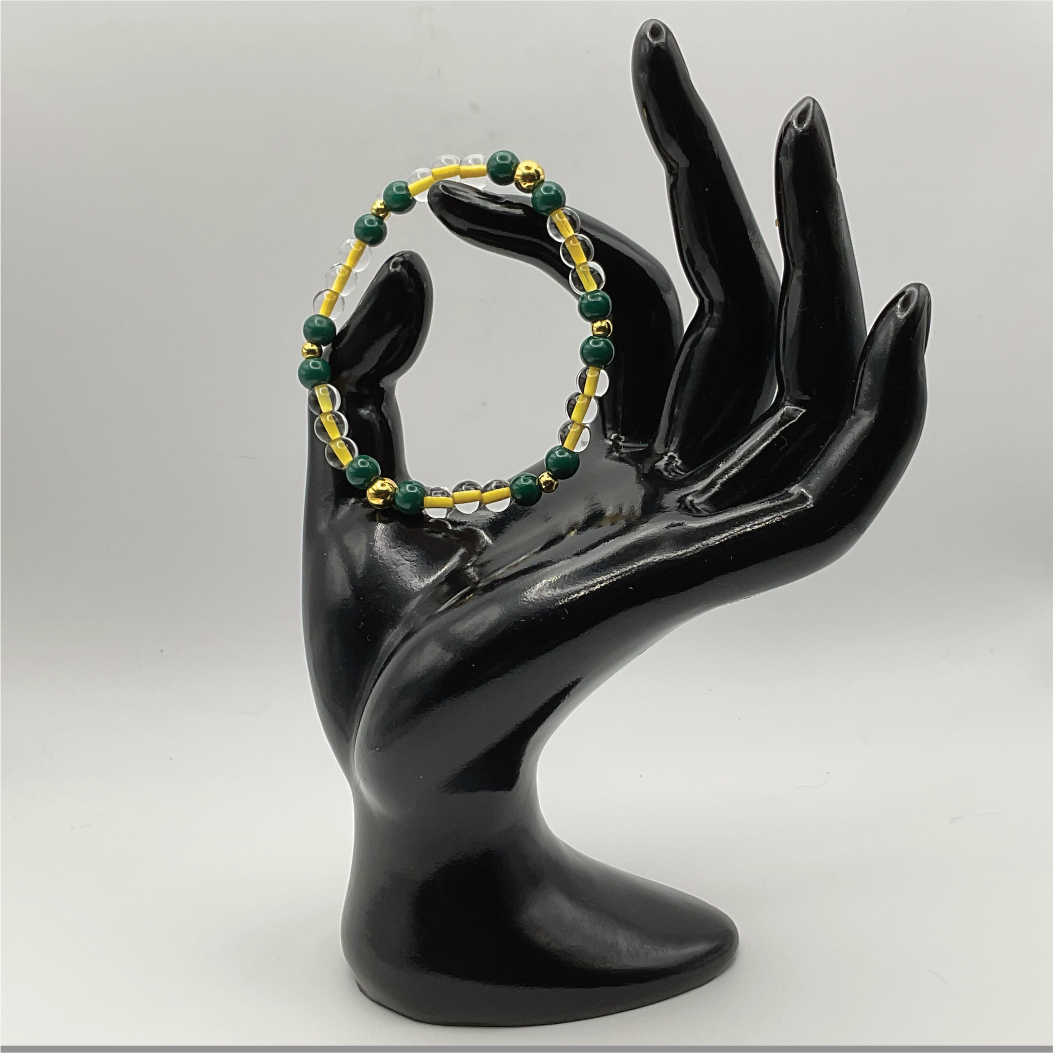 Yellow Green Glass Bracelet with Gold Spacers