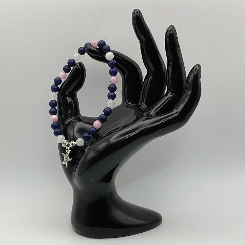 Pulsera de cuarzo rosa sodalita y cuarzo lechoso con dije de estrella de mar