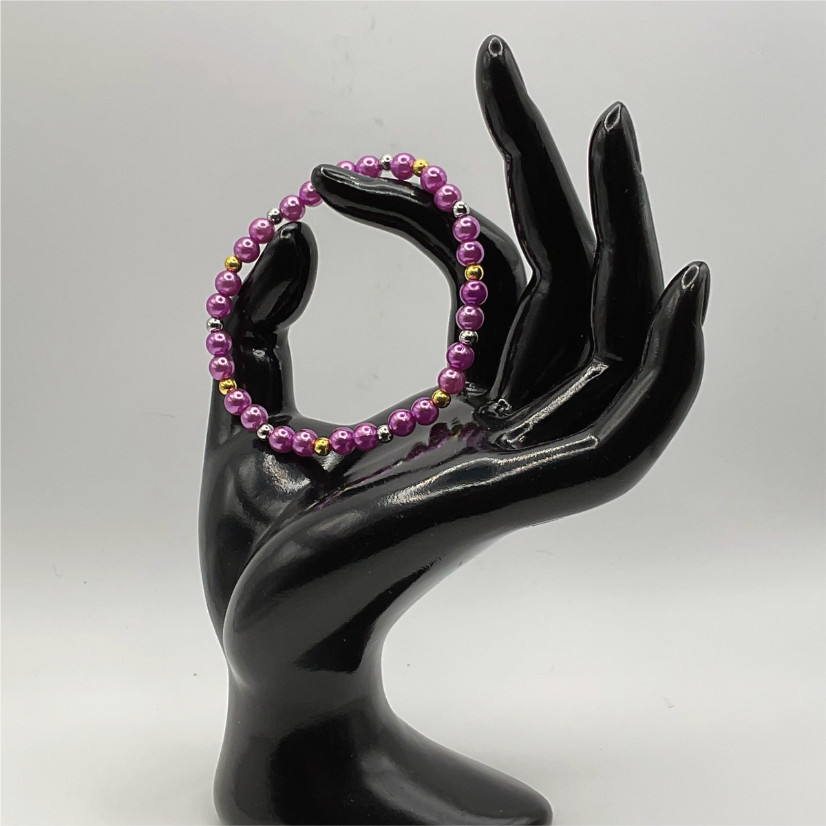 Purple Glass Bracelet with Gold and Silver Spacers
