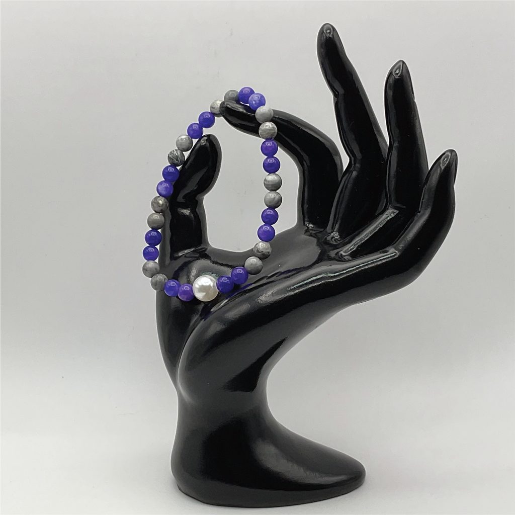 Pulsera de magnesita, amatista y perlas de imitación