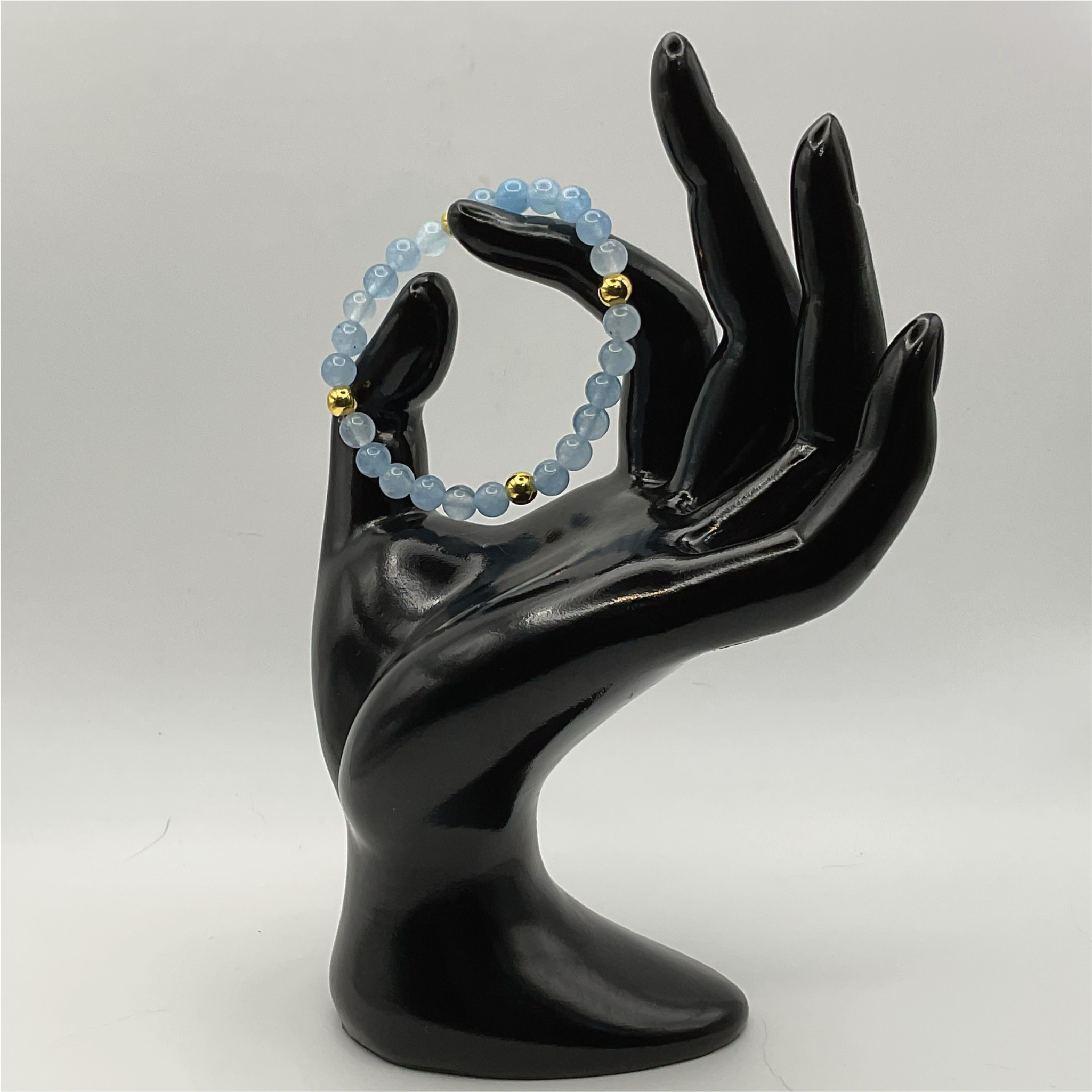 14.5 cm (5.7") Aquamarine Bracelet with Gold Spacers