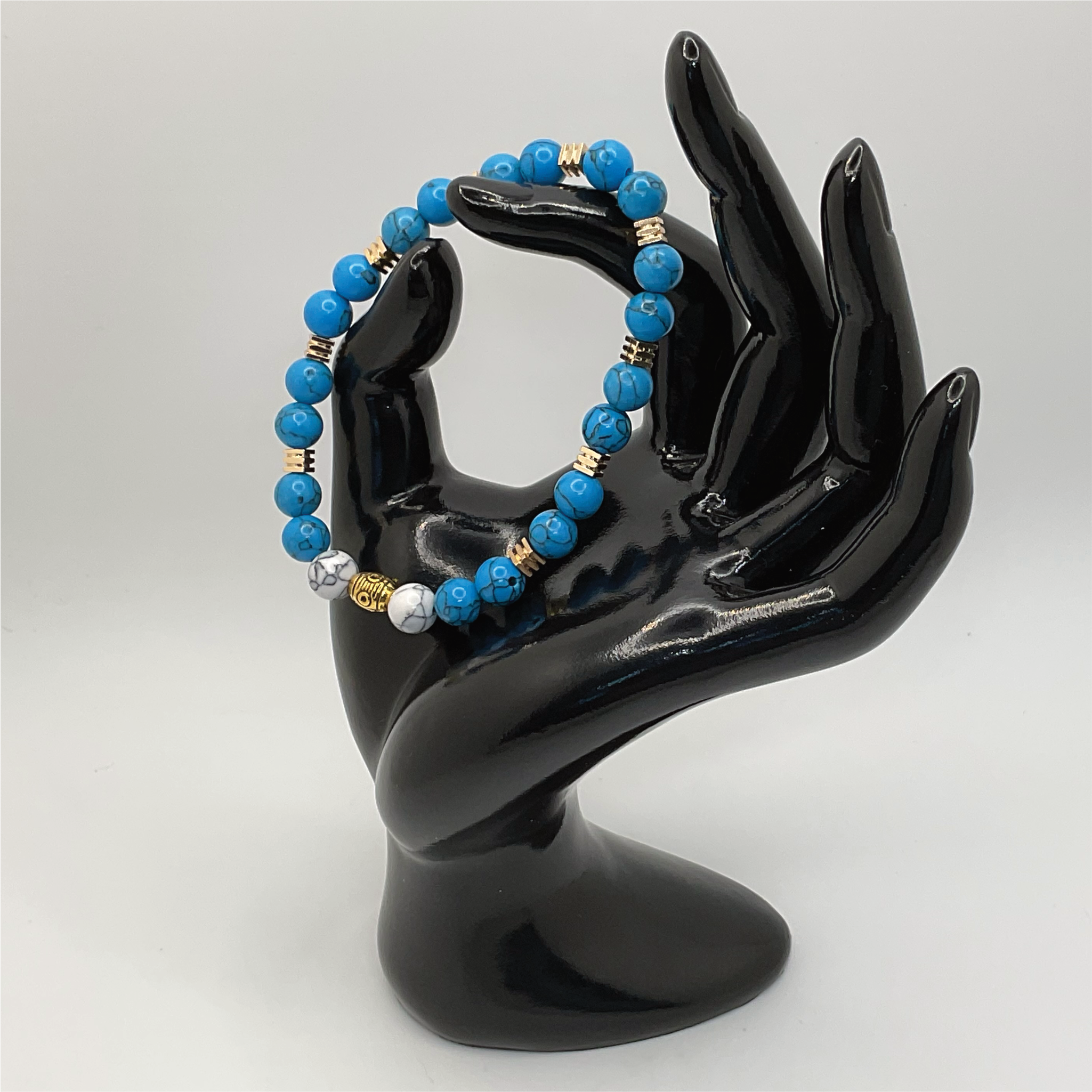 White Blue Howlite Bracelet with Gold Spacers