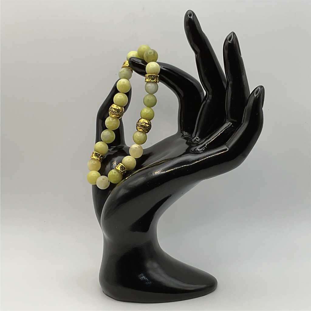 Pulsera serpiente con espaciadores tono dorado