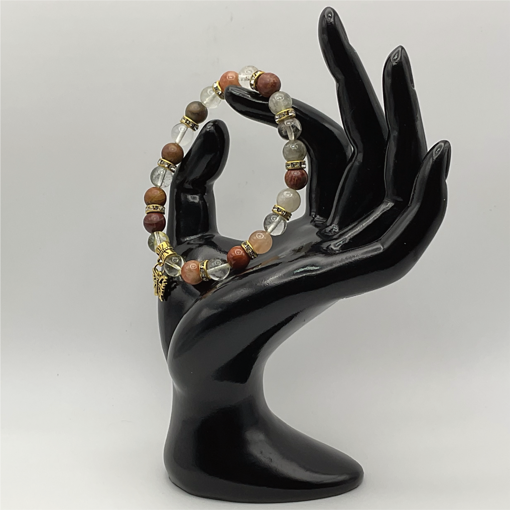 Pulsera con dije de mariposa de cuarzo transparente Jasper con separadores en tono dorado