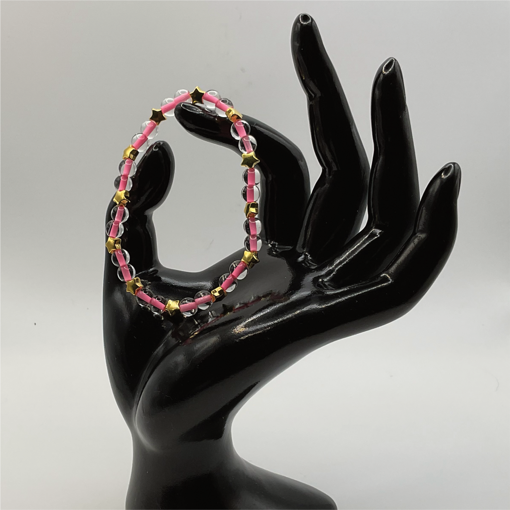 Clear Lined Pink Glass Bracelet with Gold Star Spacers