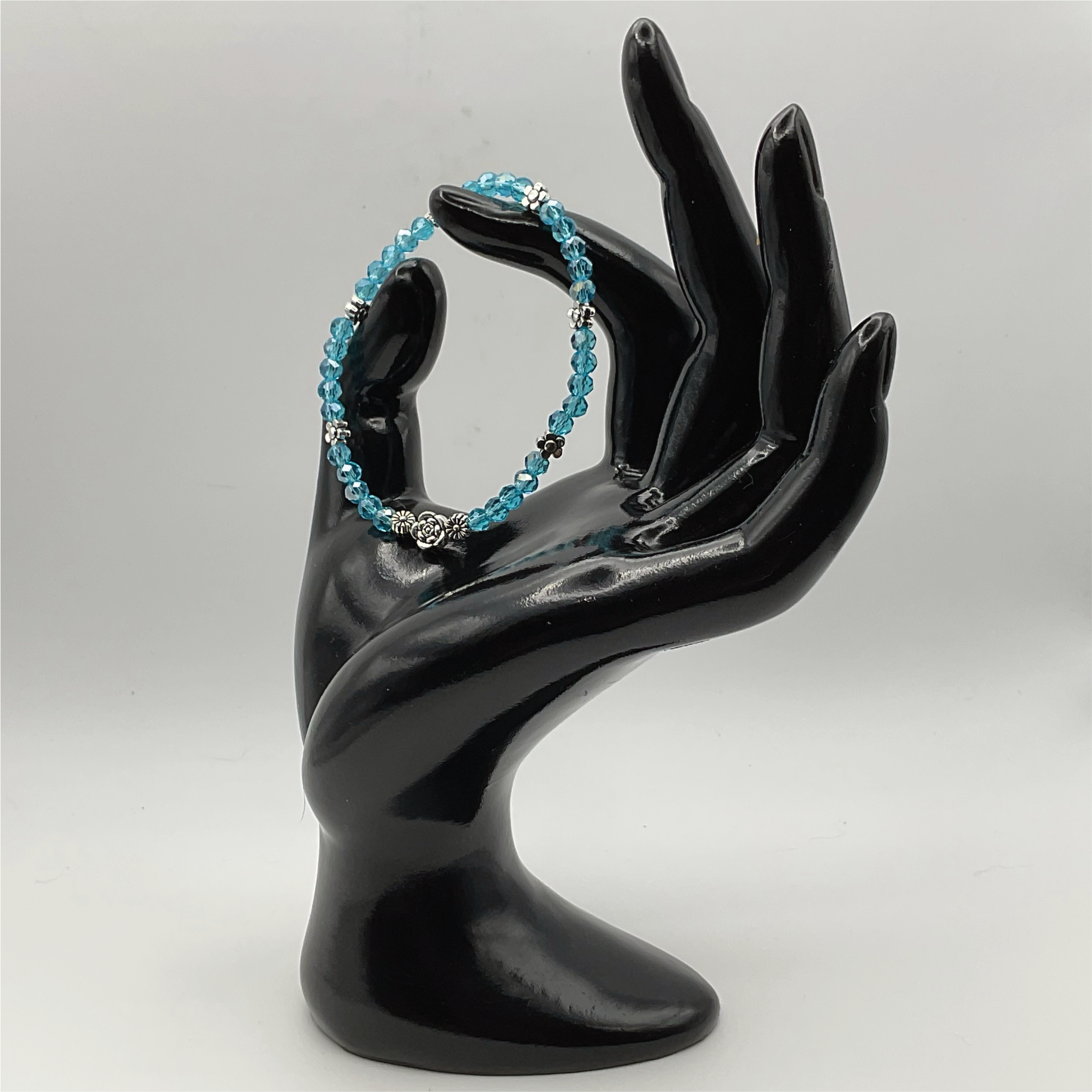15.5 cm (6.1") Light Blue Flower Bracelet with Silver Flower Spacers